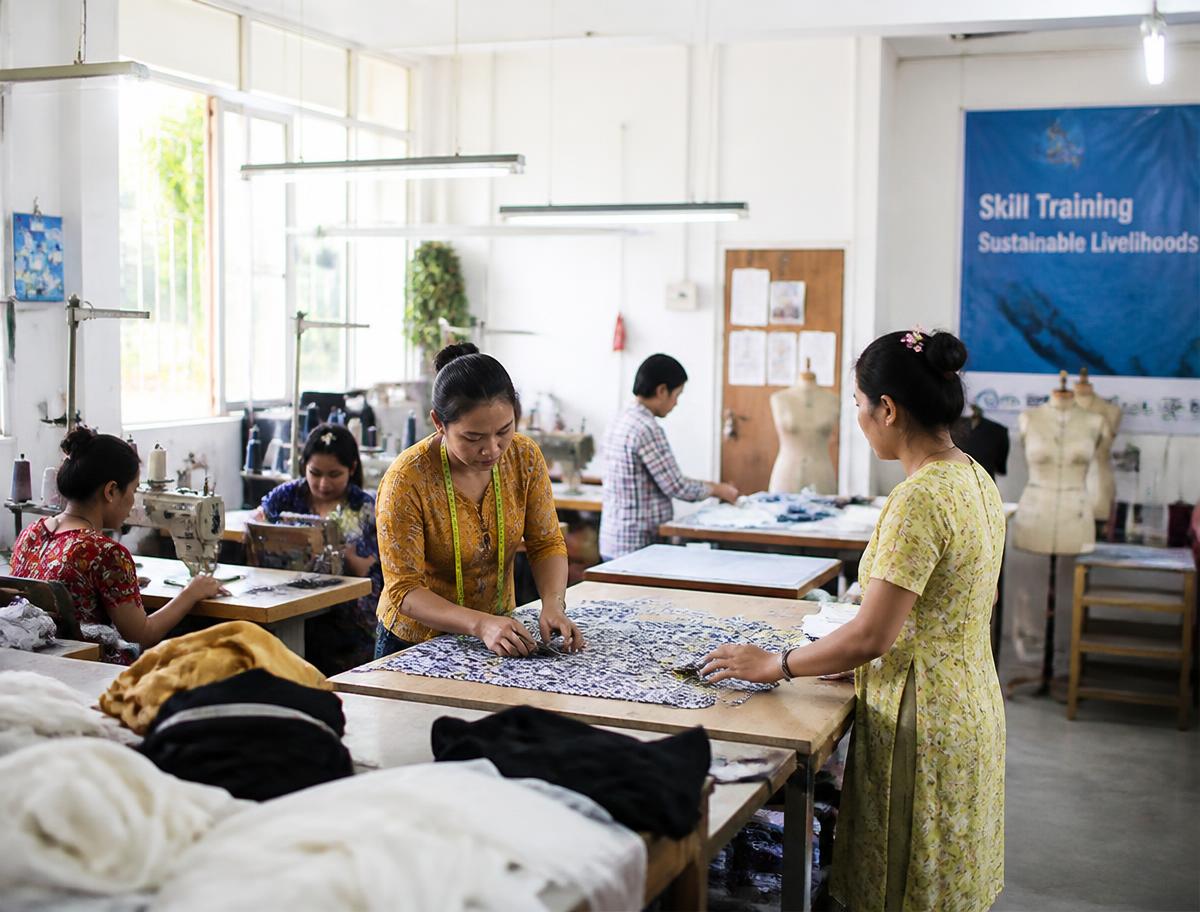 Artisans participating in a skill development training program in a bright workshop